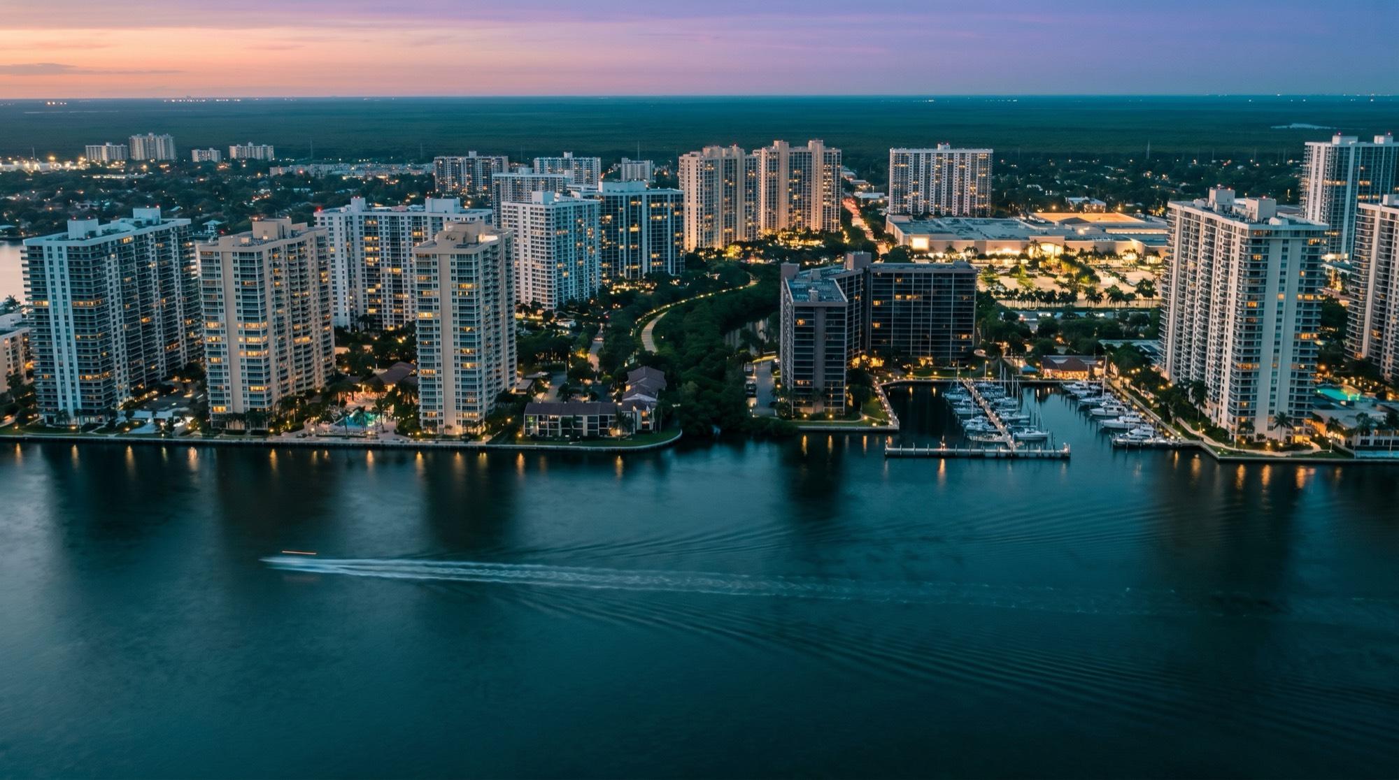 Aerial view of the Miami skyline and Biscayne Bay at dusk